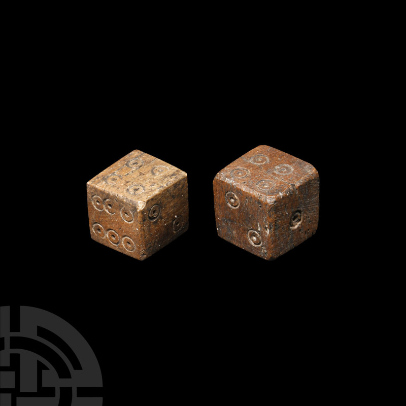 Roman Bone Dice Pair
2nd-4th century A.D. or later. With ring-and-dot markings ...