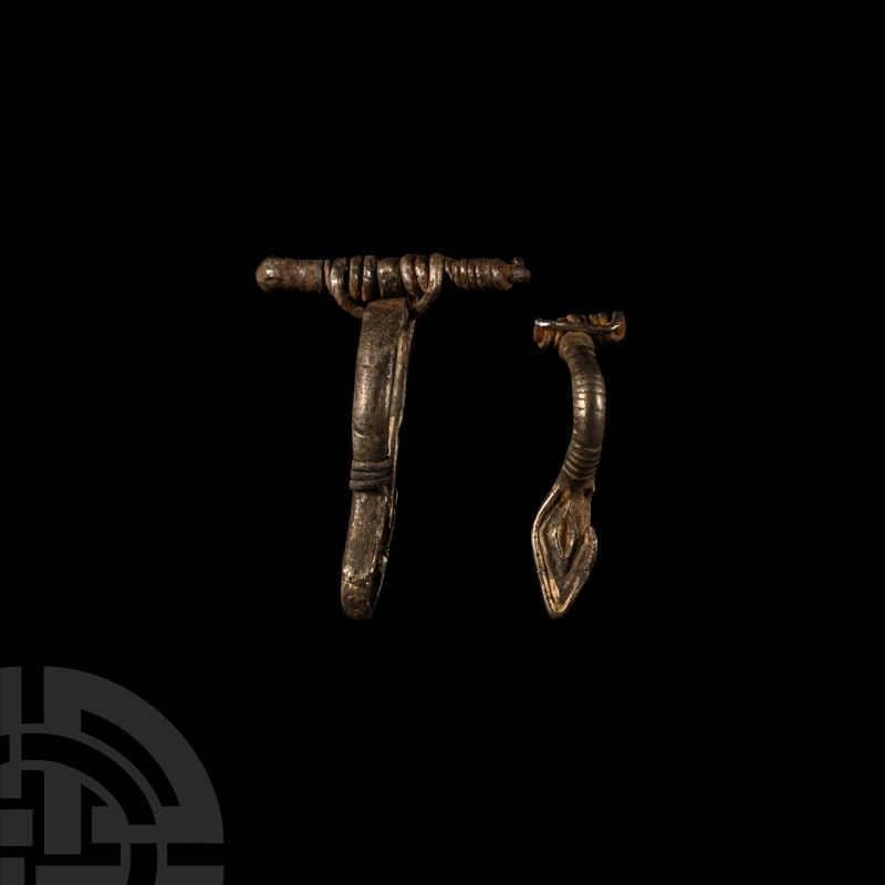 Late Roman Silver Bow Brooch Group
3rd-4th century A.D. Comprising: brooch of E...