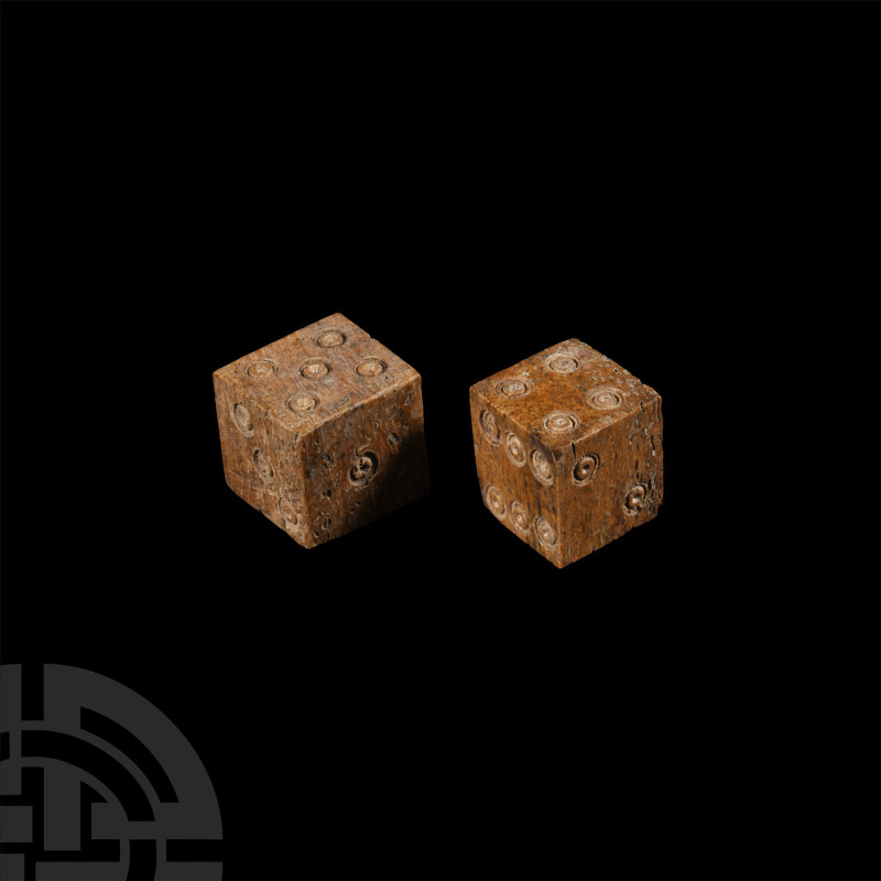 Roman Bone Dice Pair
2nd-4th century A.D. or later. With ring-and-dot markings ...