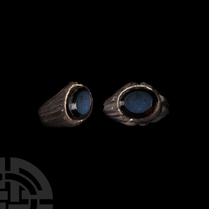 Roman Silver Ring with Gemstone
2nd-3rd century A.D. Hoop with angled shoulders...