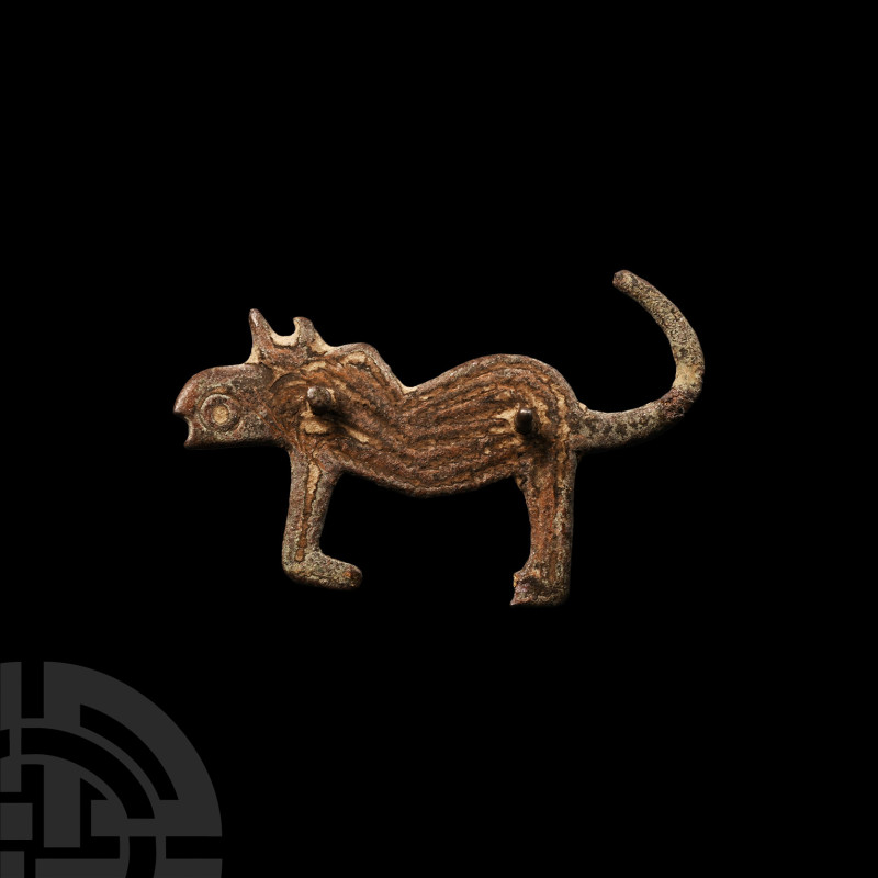 Roman Bronze Dog Brooch
2nd-3rd century A.D. The body characterised by a series...