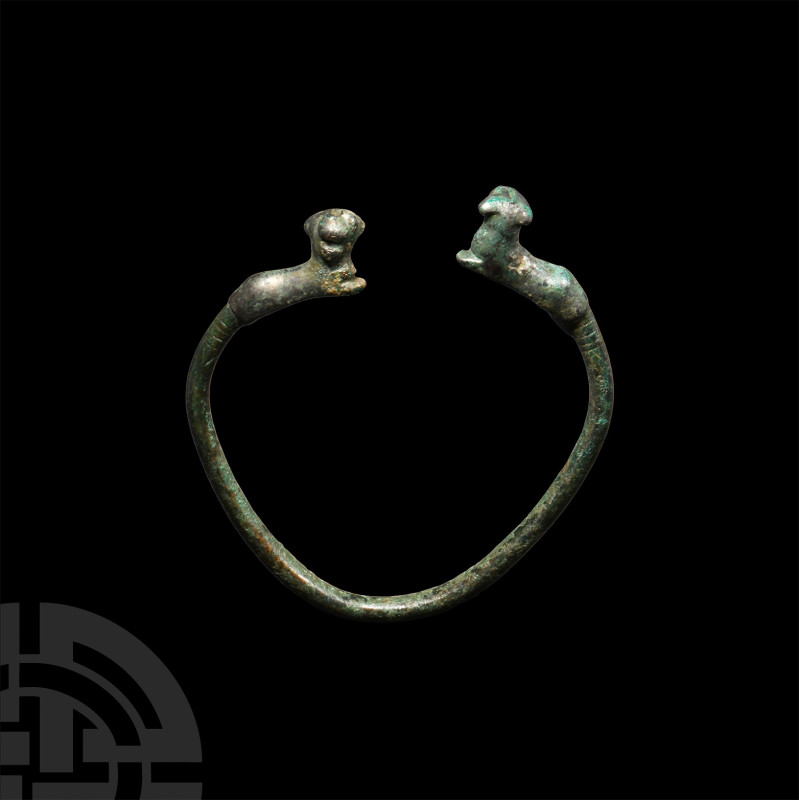 Roman Bronze Bracelet with Panthers
2nd-4th century A.D. The penannular round-s...
