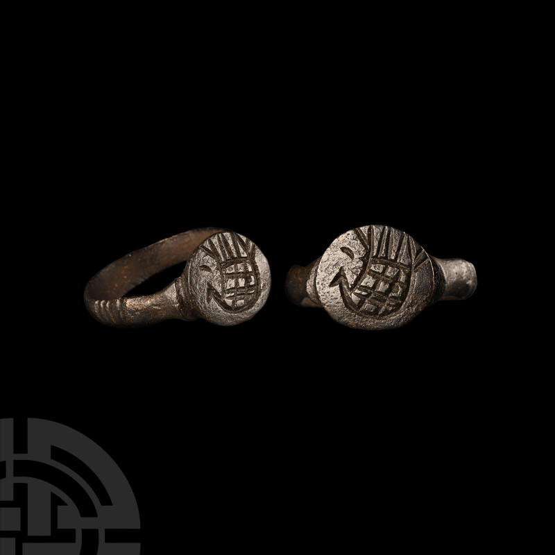 Byzantine Bronze Ring with Bird
5th-7th century A.D. Ribbed shoulders, raised t...
