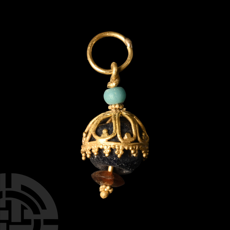Byzantine Gold Pendant with Beads
6th-8th century A.D. The openwork filigree do...