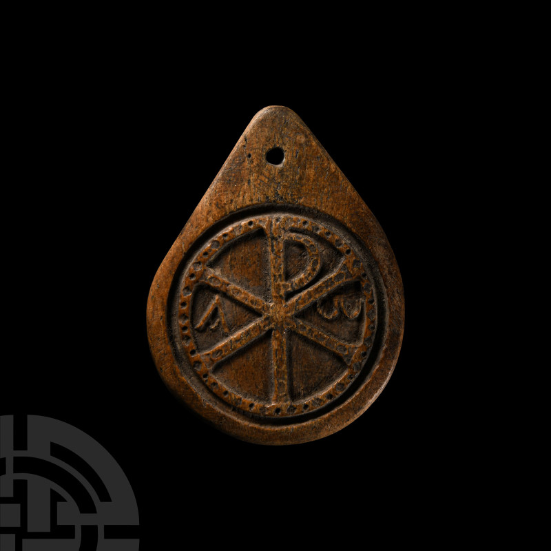 Byzantine Bone Pendant with Chi Rho
14th-15th century A.D. or later. Tear-shape...