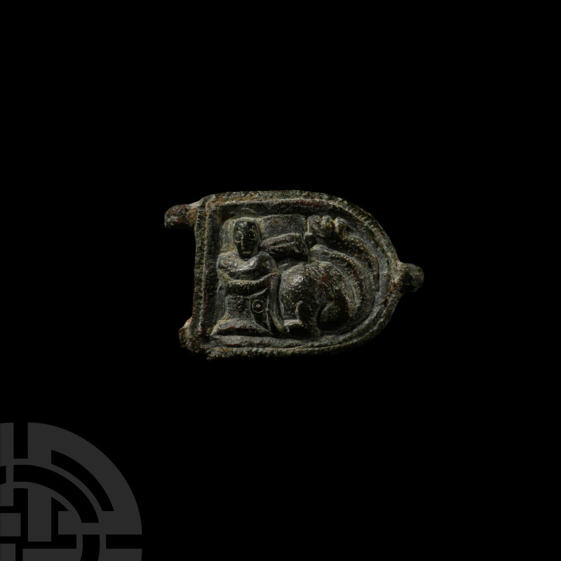Byzantine Bronze Buckle Plate with Man and Beast
10th-12th century A.D. Heater-...