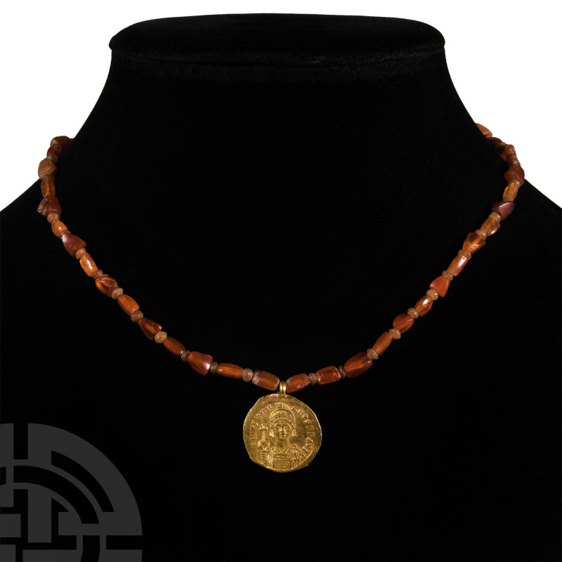 Byzantine Gold Coin Bead Necklace
Coin dated 527-565 A.D. Composed of carnelian...