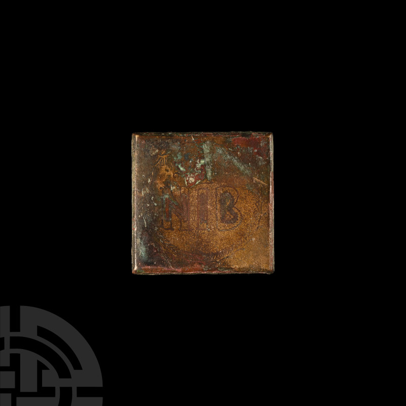 Byzantine Bronze Trade Weight
5th-6th century A.D. Square in form with 'NIB' wi...