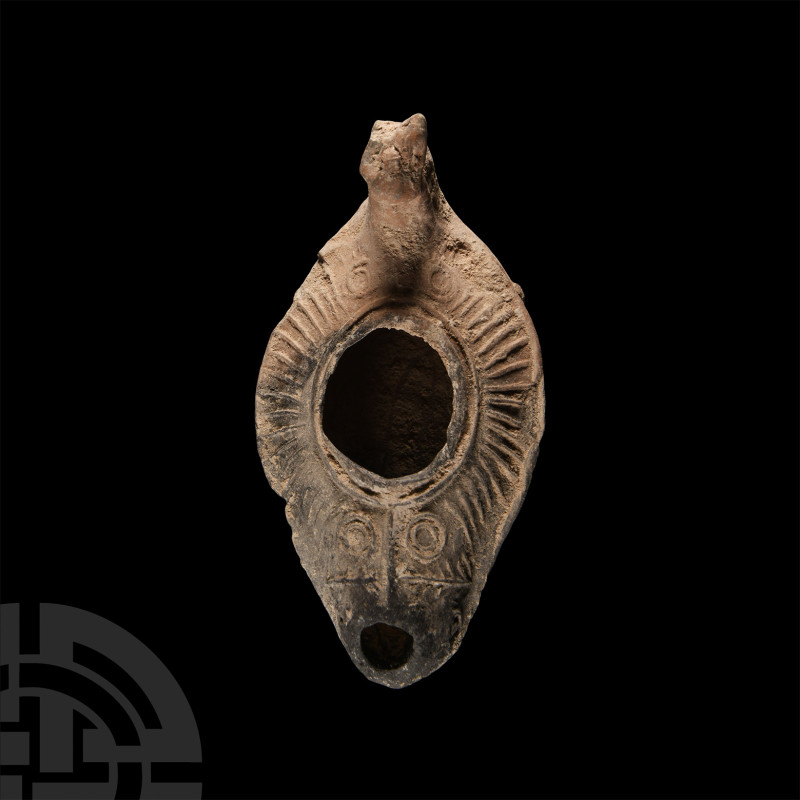 Byzantine Holy Land Terracotta Lamp with Animal-Headed Handle
6th century A.D. ...