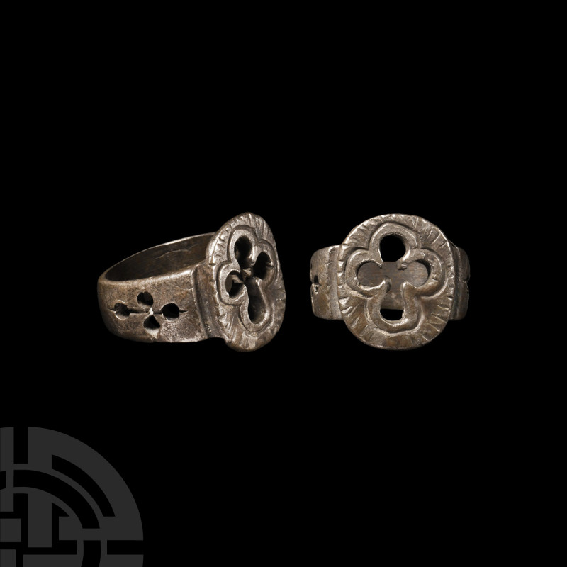 Byzantine Silver Ring with Pierced Cross
12th-14th century A.D. or later. Broad...
