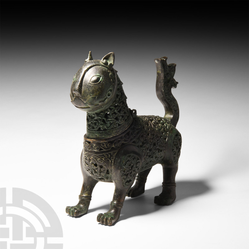 Western Asiatic Openwork Lion Incense Burner
Late 20th century A.D. Ornamented ...