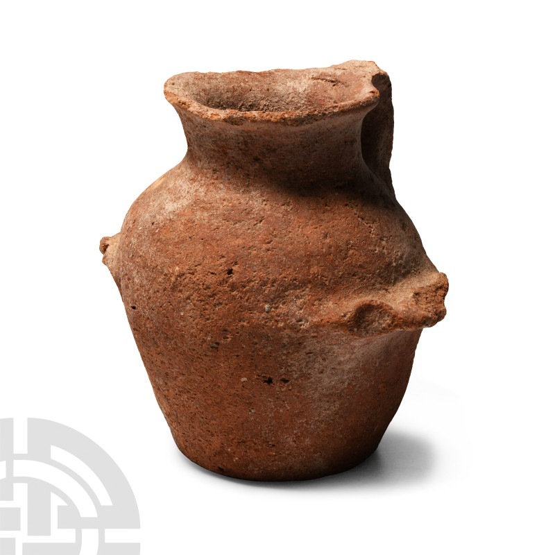 Holy Land Ceramic Jar
EB I, circa 3000 B.C. Formed with a carinated body, evert...