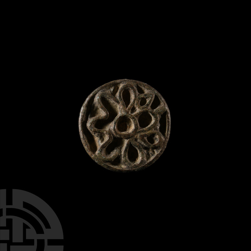 Central Asian Bronze Round Seal Matrix
Circa 2200-1800 B.C. Segmented disc with...