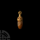 Western Asiatic Gold Pendant with Carnelian Bead