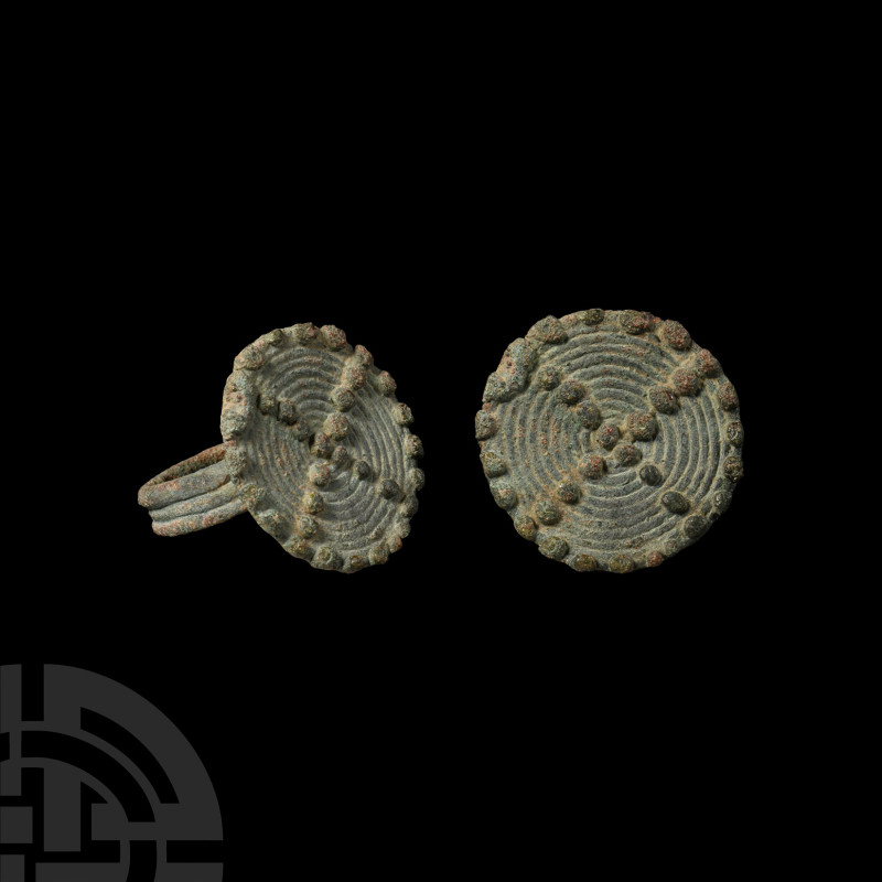 Amlash Decorated Bronze Ring
1st millennium B.C. The circular bezel formed from...