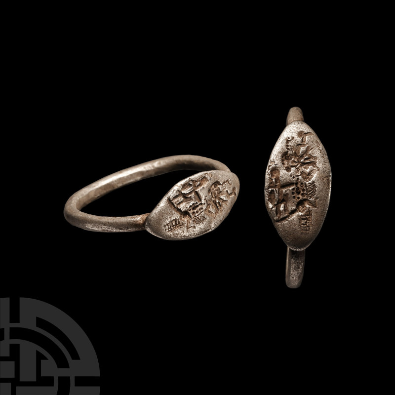 Achaemenid Silver Ring with Warriors
7th-4th century B.C. With scaphoid bezel, ...
