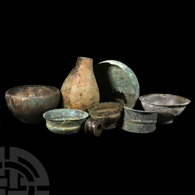 Western Asiatic Bronze Artefact Group
Circa 1st millennium B.C. Comprising a ti...