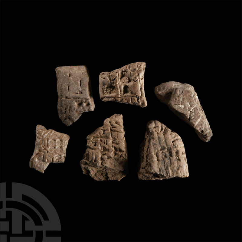 Mesopotamian Clay Cuneiform Tablet Fragment Group
Circa 2nd millennium B.C. Eac...