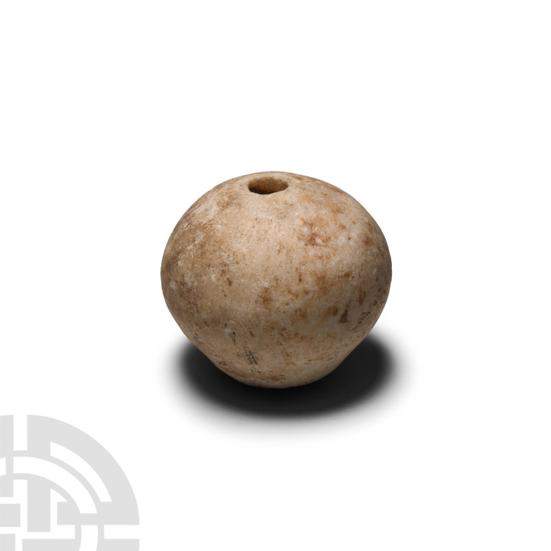Western Asiatic White Stone Macehead
4th millennium B.C. Drilled for attachment...