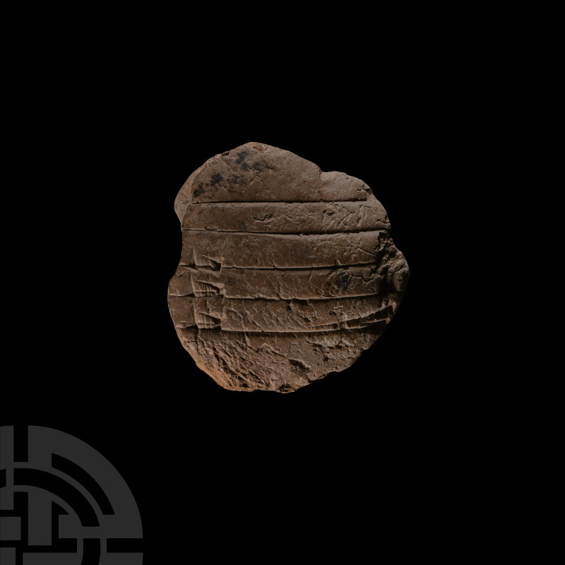 Old Babylonian Clay Cuneiform School Tablet
Circa 1894-1595 B.C. Roughly circul...