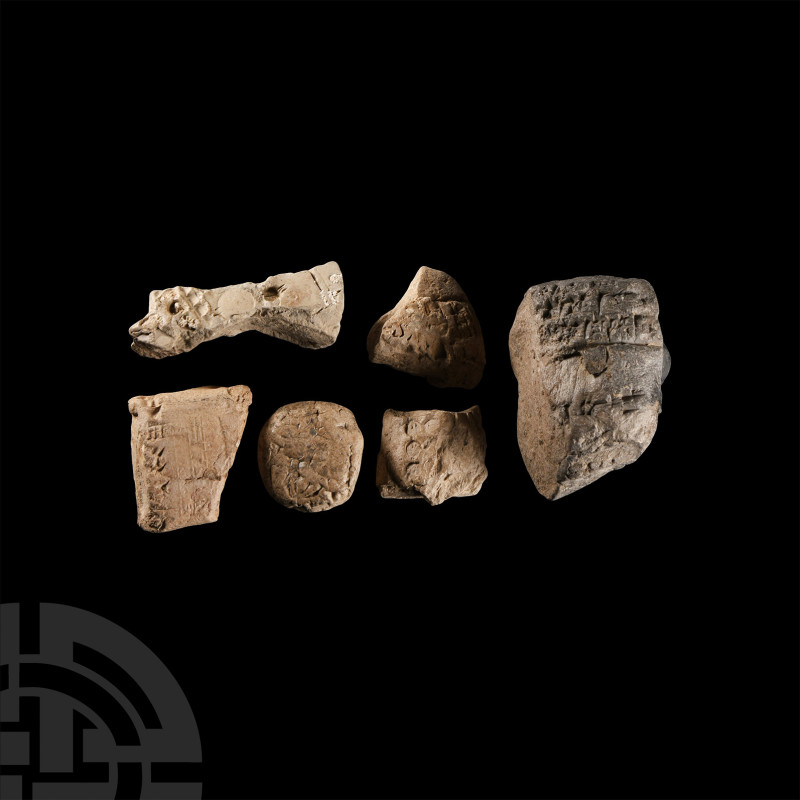 Mesopotamian Clay Cuneiform Tablet Fragment Group
Circa 2nd millennium B.C. Eac...