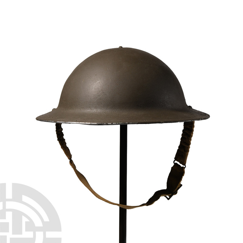 British WWII 'Tommy's' Helmet
1939-1945 A.D. Standard issue steel helmet with l...