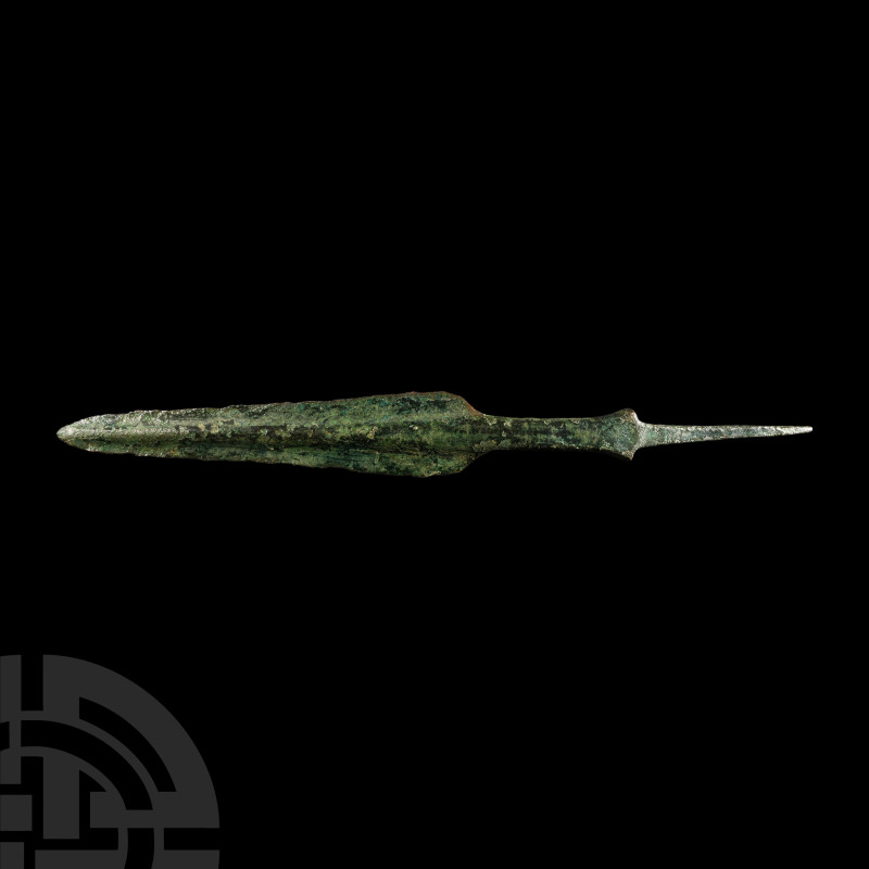 Large Luristan Bronze Spearhead
1st millennium B.C. Composed of a leaf-shaped b...