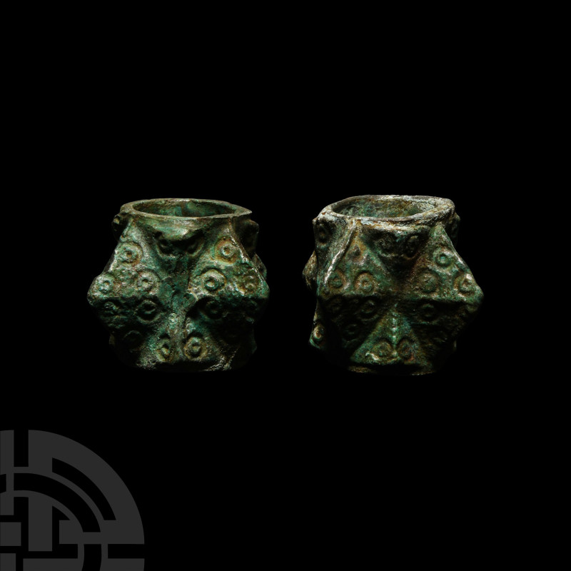 Medieval Decorated Bronze Macehead Group
14th century A.D. Each with four large...