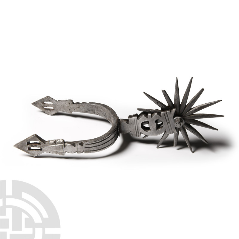 Mexican Iron Rowel Spur
18th-19th century A.D. Heelband with geometric motifs, ...
