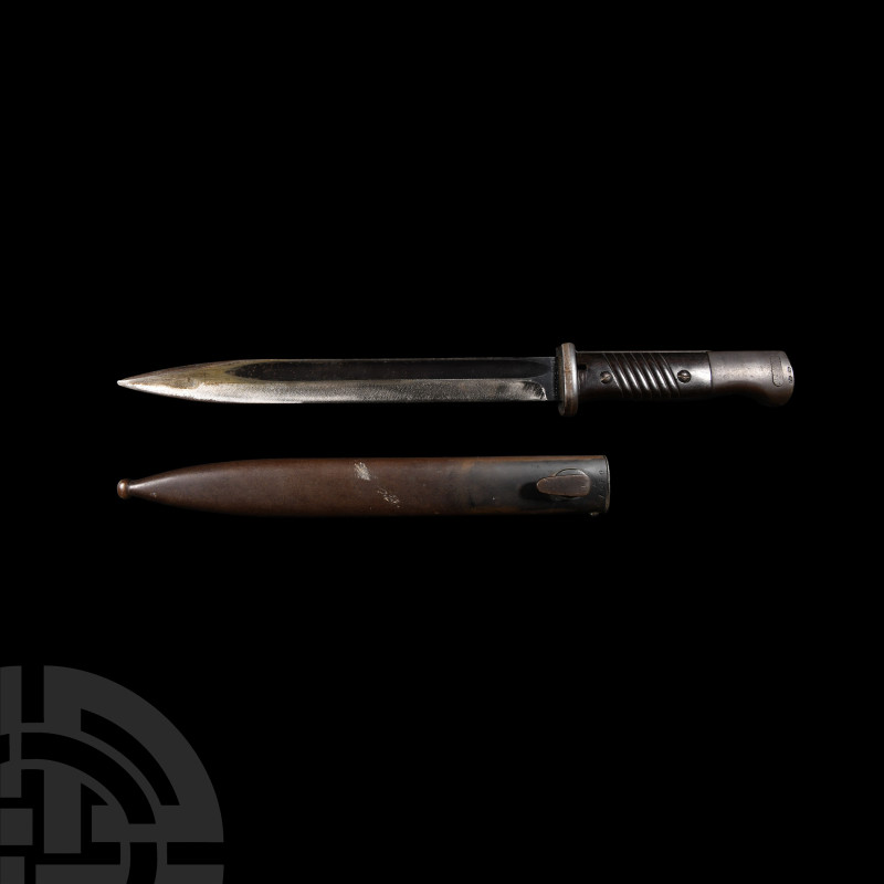 German M1884/98 Third Model Bayonet and Scabbard
Dated 1940 A.D. Comprising a k...