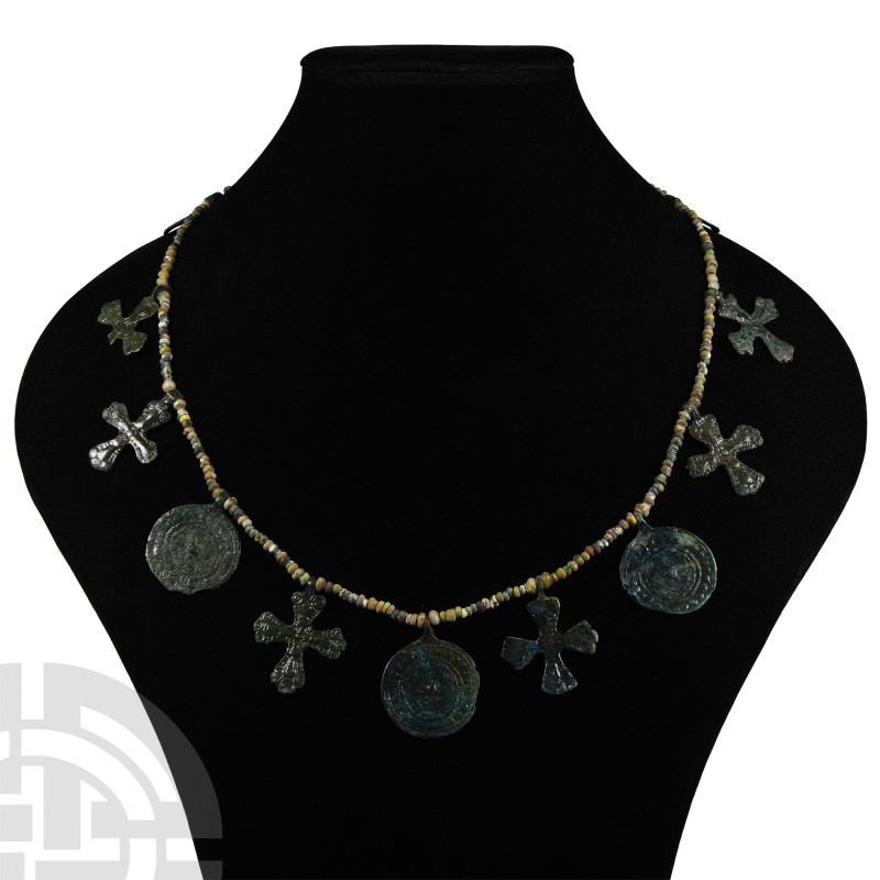 Viking Age Glass Bead Necklace with Bronze Pendants
9th-11th century A.D. or la...