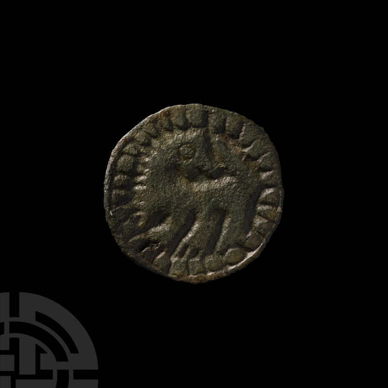 Viking Bronze Disc Brooch with Regardant Beast
9th century A.D. Displayed in lo...