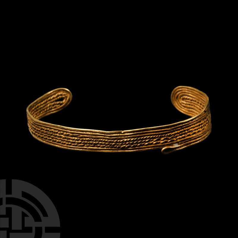 Viking Age Twisted Gold Wire Bracelet
9th-11th century A.D. Composed of decorat...