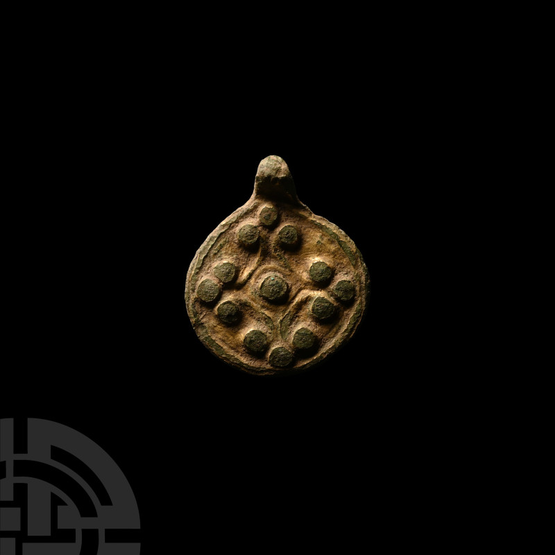 Viking Age Gilt Bronze Pendant with Lobed Cross
9th-11th century A.D. Composed ...