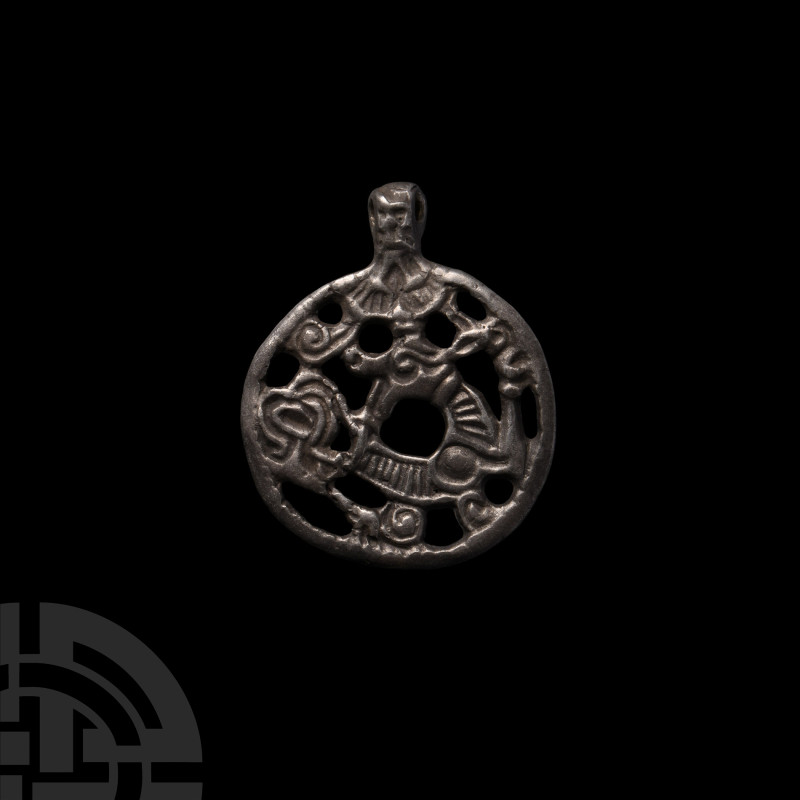 Viking Silver Openwork Dragon Pendant
10th-11th century A.D. An integral loop o...