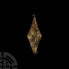 Anglo-Saxon Gilt Lozenge-Shaped Brooch with complex Diamond Design