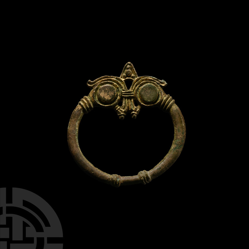 Viking Gilt Bronze Penannular Brooch Loop
9th-11th century A.D. Featuring tiere...