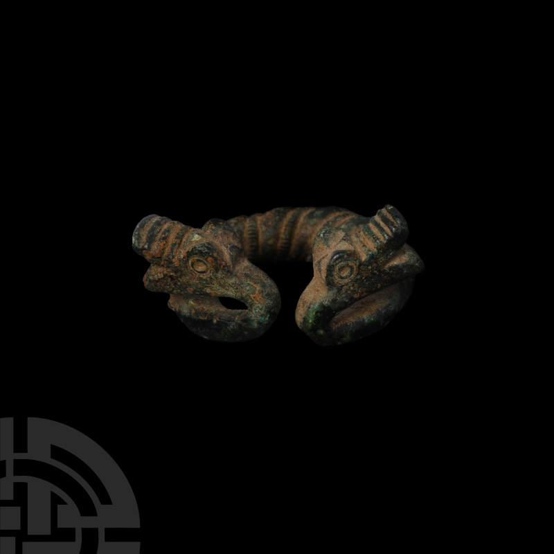 Large Viking Age Bronze Penannular Brooch with Dragon Heads
9th-11th century A....