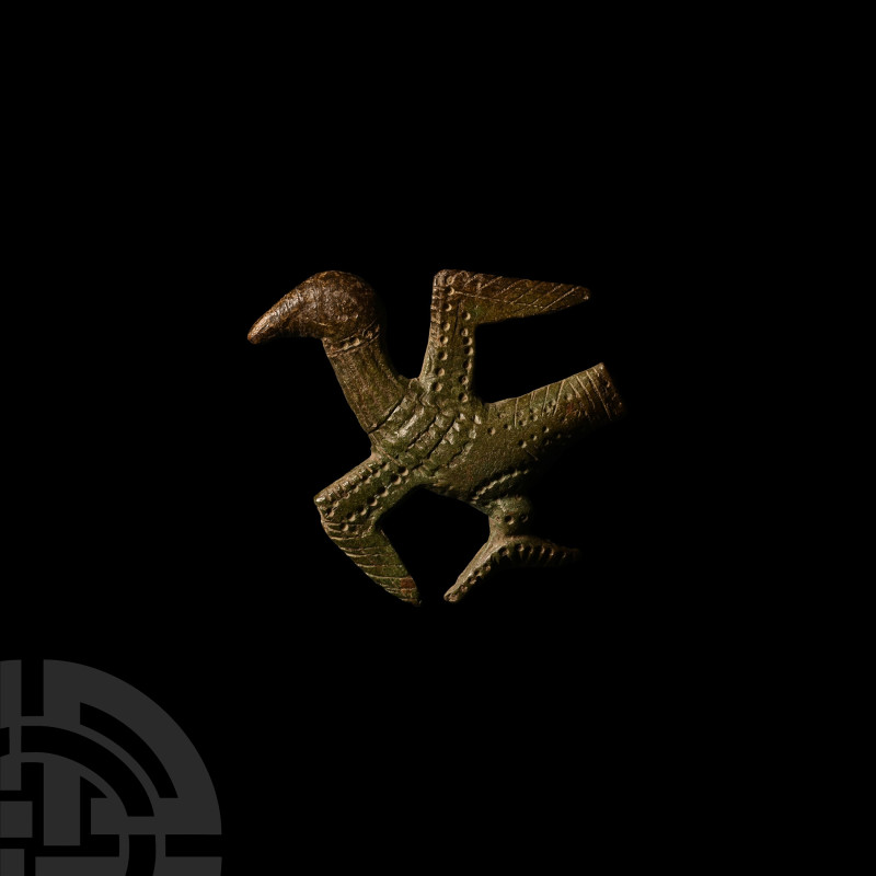 Viking Age Bronze Bird Mount
9th-11th century A.D. Formed standing left with wi...