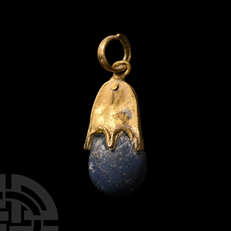 Viking Age Gold Elf Shot Pendant
9th-10th century A.D. or earlier. Featuring a ...