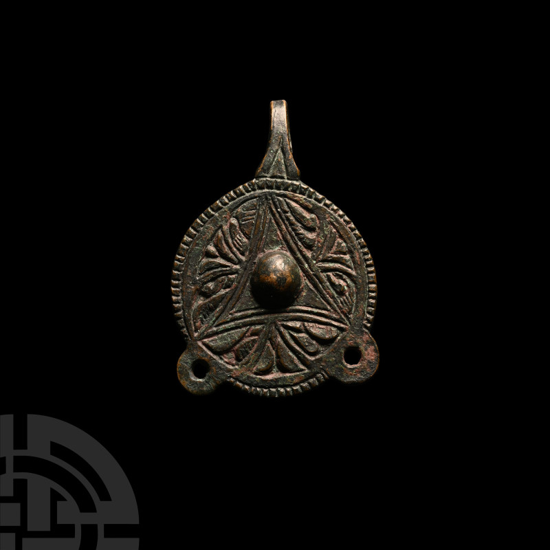 Anglo-Saxon Bronze Clothes Fastener
9th century A.D. Featuring two pierced lugs...