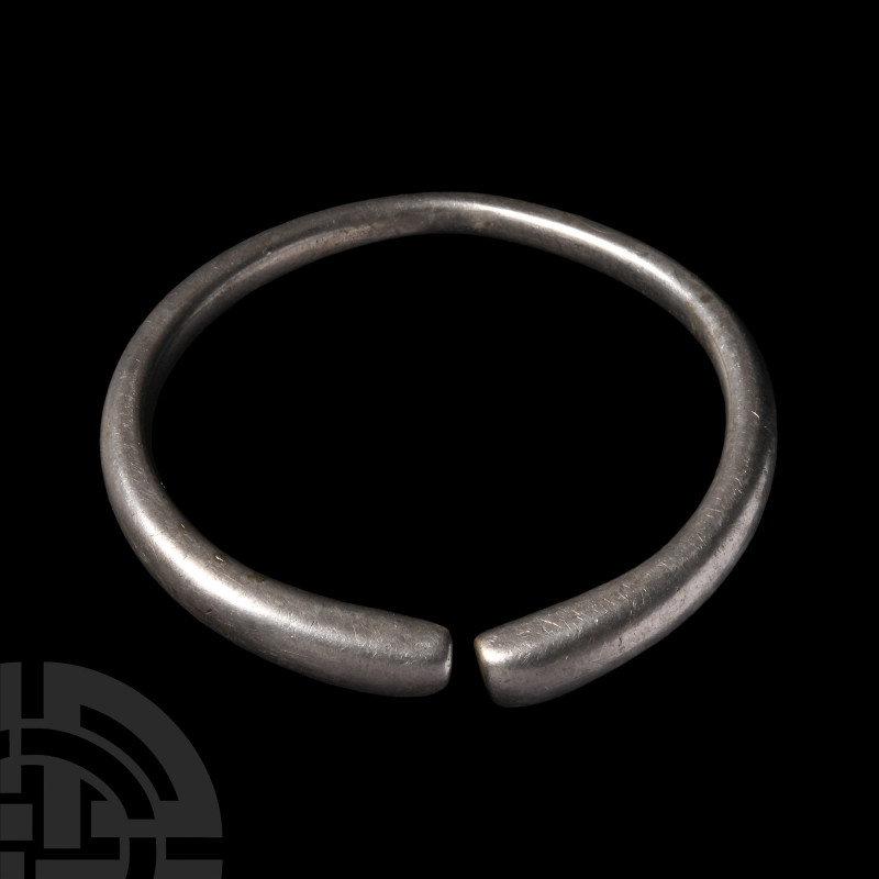 Viking Age Silver Bracelet
9th-11th century A.D. Composed of a penannular body ...