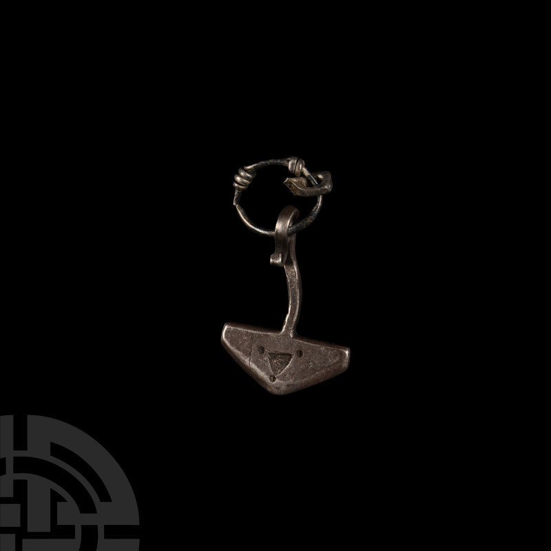 Viking Age Silver Thor's Hammer Pendant
10th-12th century A.D. With stamped tri...
