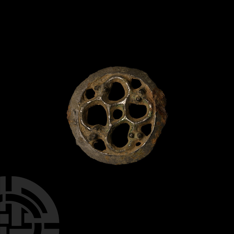 Viking Age Tinned Bronze Openwork Disc Brooch
Circa 10th century A.D. Displayin...
