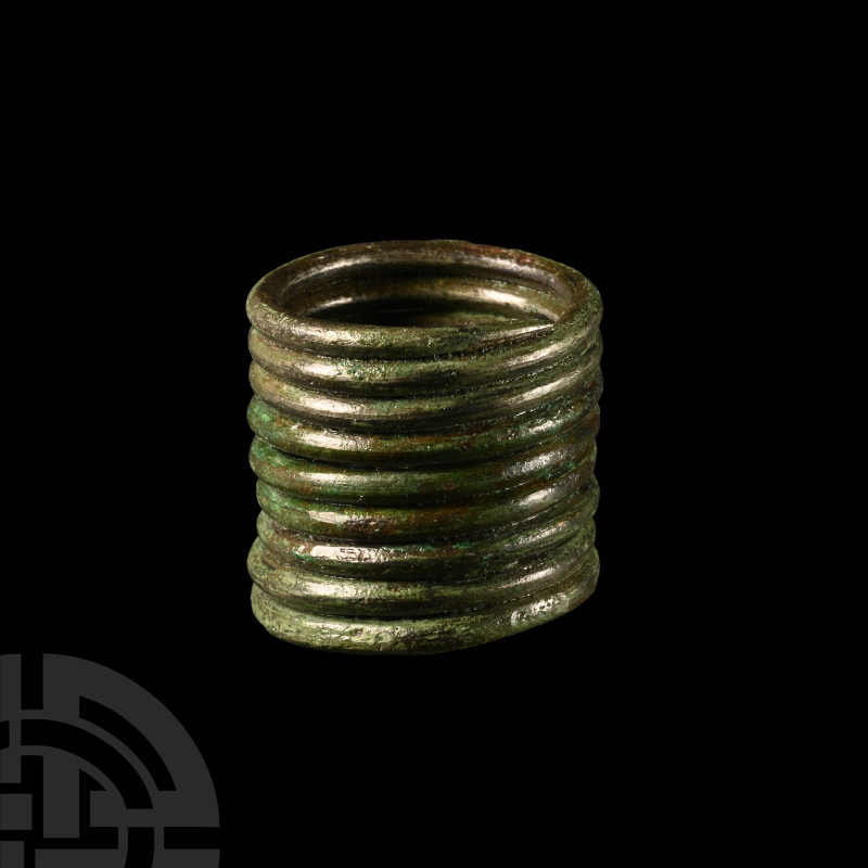 Viking Coiled Bronze Ring
9th-11th century A.D. Composed of nine tiers of round...
