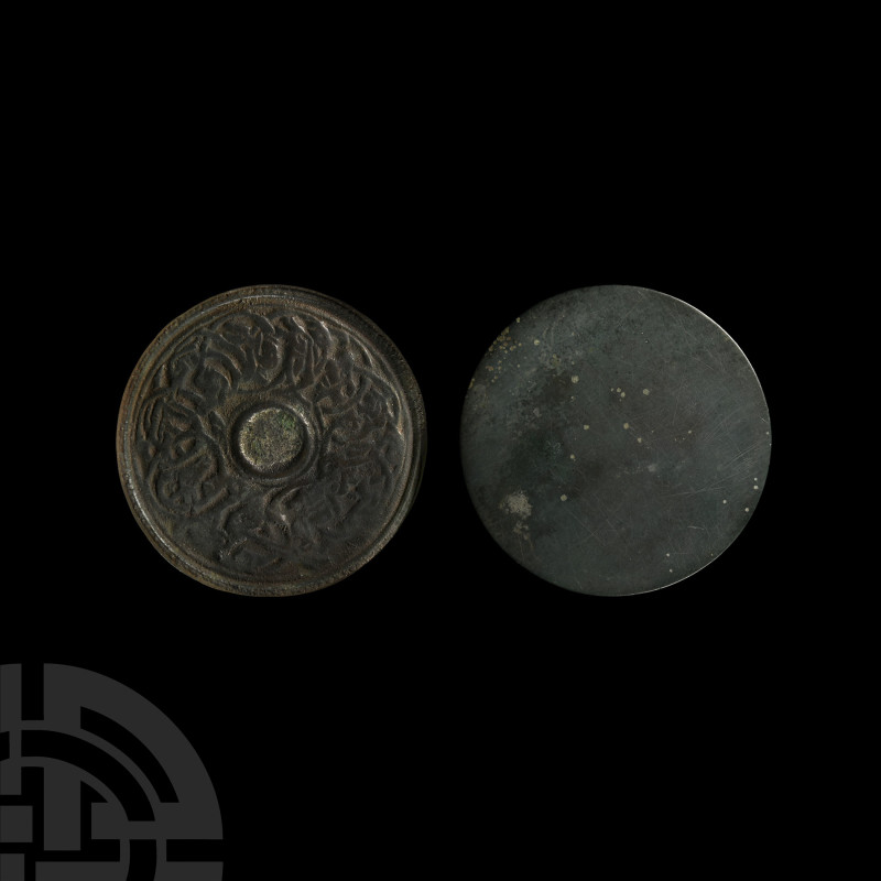 Viking Age Bronze Mirror with Interlaced Animals
9th-12th century A.D. Comprisi...