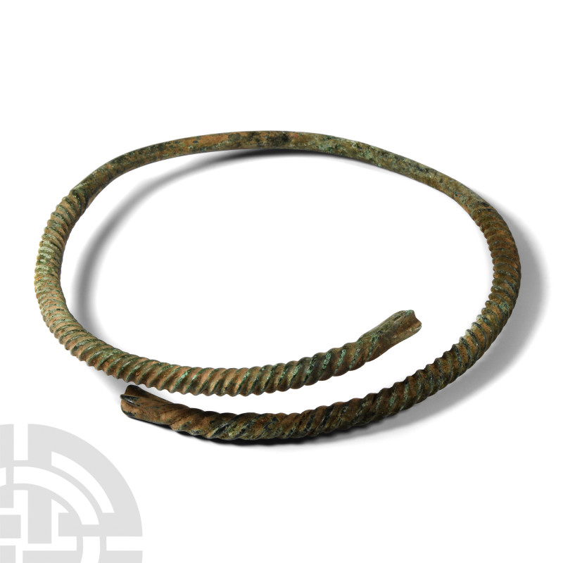 Pre-Viking Bronze Twisted Torc
Circa 8th century A.D. Composed of overlapping a...
