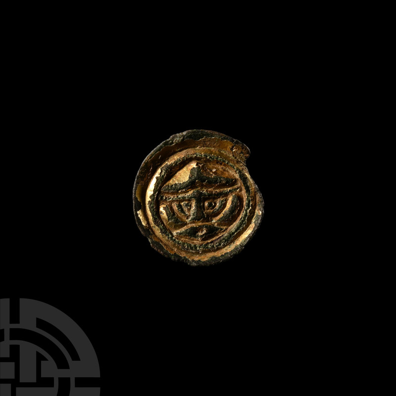 Anglo-Saxon Gilt Bronze Button Brooch with Helmetted Warrior
5th-6th century A....