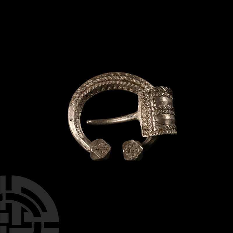Viking Age Decorated Silver Penannular Brooch
12th century A.D. Displaying face...