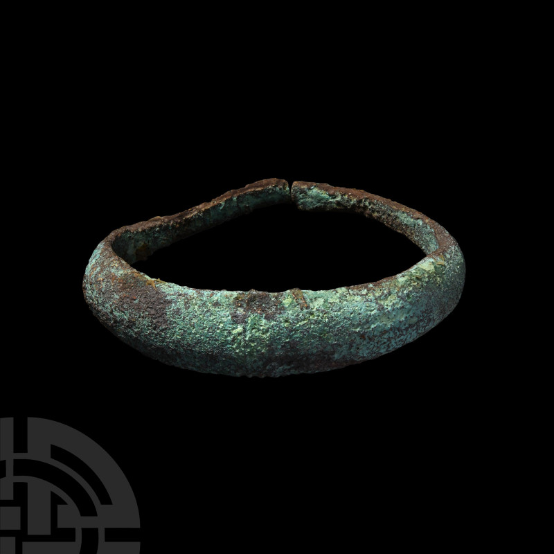 Viking Age Bronze Bracelet
9th-11th century A.D. Composed of tapering arms and ...